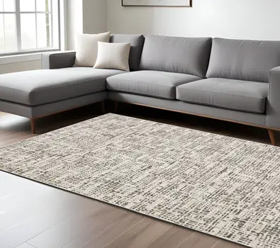 7' X 10' Ivory And Gray Abstract Area Rug