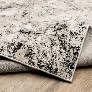 2' X 8' Ivory Grey Black Beige And Tan Abstract Power Loom Stain Resistant Runner Rug