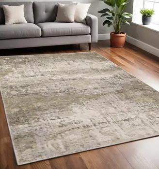 5' X 8' Beige Grey Ivory Tan And Brown Abstract Power Loom Stain Resistant Area Rug