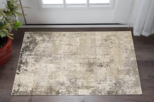 3' X 5' Beige Grey Ivory Tan And Brown Abstract Power Loom Stain Resistant Area Rug