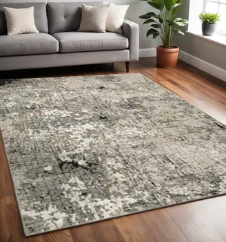 5' X 8' Grey Ivory Beige Charcoal Black Tan And Brown Abstract Power Loom Stain Resistant Area Rug