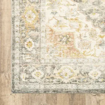 5' X 7' Grey Gold Orange And Ivory Oriental Power Loom Stain Resistant Area Rug