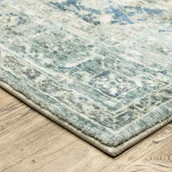 8' X 10' Grey Blue And Ivory Oriental Power Loom Stain Resistant Area Rug