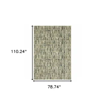 7' X 9' Green And Ivory Abstract Shag Area Rug