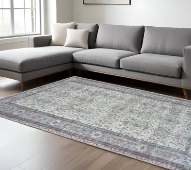 8' X 11' Ivory And Blue Oriental Power Loom Stain Resistant Area Rug