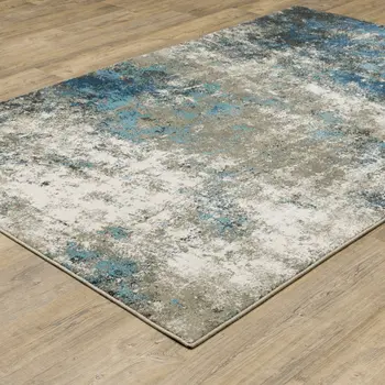 4' X 6' Blue Grey And Beige Abstract Power Loom Stain Resistant Area Rug