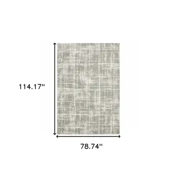 6' X 9' Grey And Ivory Abstract Shag Power Loom Stain Resistant Area Rug
