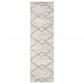 2' X 8' Ivory And Grey Geometric Shag Power Loom Stain Resistant Runner Rug
