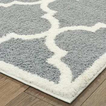 5' X 8' Grey And Ivory Geometric Shag Power Loom Stain Resistant Area Rug
