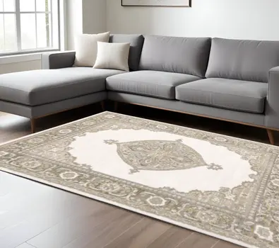 10' X 13' Beige and Ivory Oriental Power Loom Area Rug