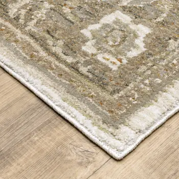 7' X 10' Beige and Ivory Oriental Power Loom Area Rug