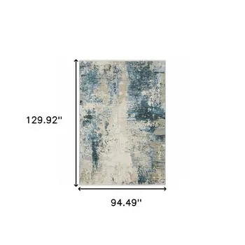 8' X 11' Blue Grey Ivory Light Blue And Dark Blue Abstract Power Loom Stain Resistant Area Rug With Fringe
