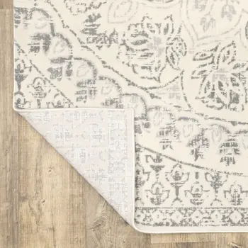 2' X 8' Ivory And Grey Floral Power Loom Stain Resistant Runner Rug