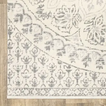 2' X 8' Ivory And Grey Floral Power Loom Stain Resistant Runner Rug