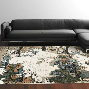 10' X 13' Blue and Ivory Abstract Power Loom Area Rug