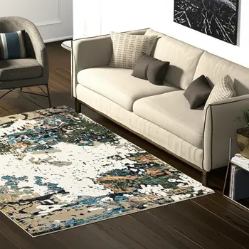 5' X 7' Blue and Ivory Abstract Power Loom Area Rug