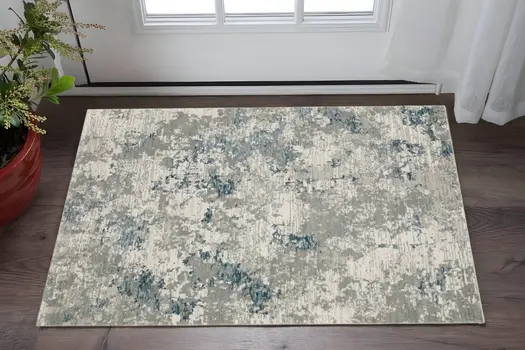 3' X 5' Blue and Beige Abstract Power Loom Area Rug
