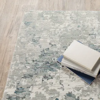 3' X 5' Blue and Beige Abstract Power Loom Area Rug