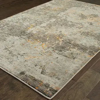 7' X 10' Gray and Ivory Abstract Power Loom Area Rug