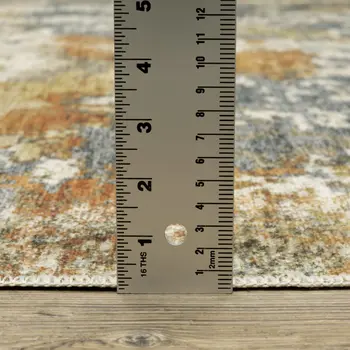 5' X 7' Teal Blue And Gold Abstract Distressed Area Rug