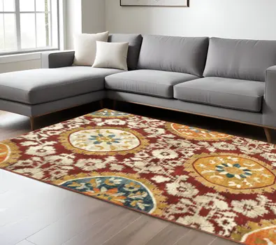 10' X 13' Red Gold Teal Grey Ivory And Blue Oriental Power Loom Stain Resistant Area Rug