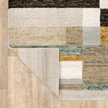 9' X 12' Beige Gold Black Grey Tan Teal and Rust Geometric Power Loom Area Rug