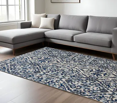7' X 10' Blue and Ivory Floral Distressed Non Skid Area Rug