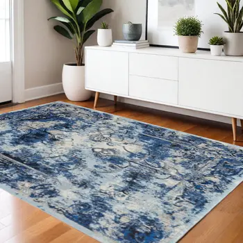 4' X 6' Blue Ivory And Gray Floral Distressed Stain Resistant Area Rug