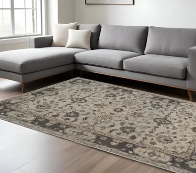 8' X 11' Gray Ivory And Taupe Wool Floral Tufted Handmade Stain Resistant Area Rug