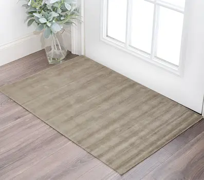 2' X 3' Tan Ivory And Taupe Hand Woven Area Rug