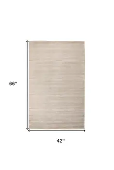 4' X 6' Ivory And Taupe Hand Woven Distressed Area Rug