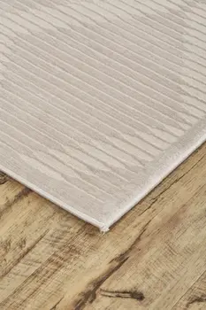8' X 11' Ivory And Tan Geometric Stain Resistant Area Rug