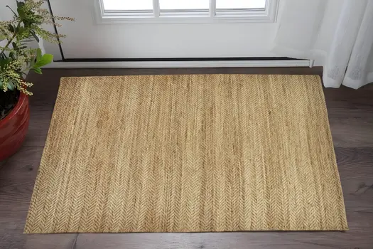 2' X 3' Tan Orange And Brown Hand Woven Area Rug