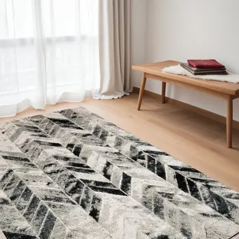 5' X 8' Black Gray And Silver Geometric Stain Resistant Area Rug