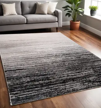 5' X 8' Beige and Black Abstract Non Skid Area Rug