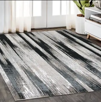 5' X 8' Black Silver and Gray Abstract Power Loom Area Rug