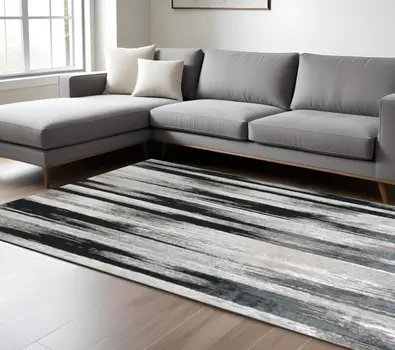 9' X 12' Black Silver and Gray Abstract Power Loom Area Rug