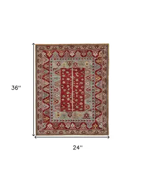 2' X 3' Red Blue And Brown Wool Floral Hand Knotted Distressed Stain Resistant Area Rug With Fringe
