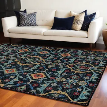 9' X 12' Blue Yellow And Red Wool Floral Hand Knotted Distressed Stain Resistant Area Rug With Fringe