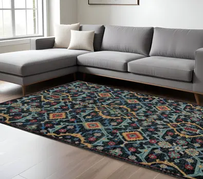 10' X 13' Blue Yellow And Red Wool Floral Hand Knotted Distressed Stain Resistant Area Rug With Fringe