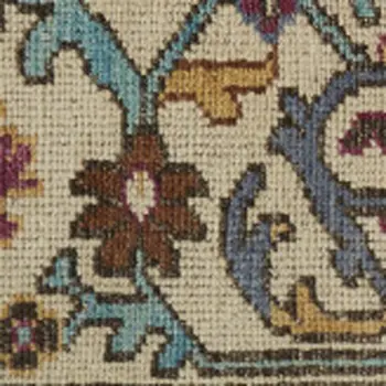 4' X 6' Ivory and Blue Wool Floral Hand Knotted Distressed Area Rug With Fringe