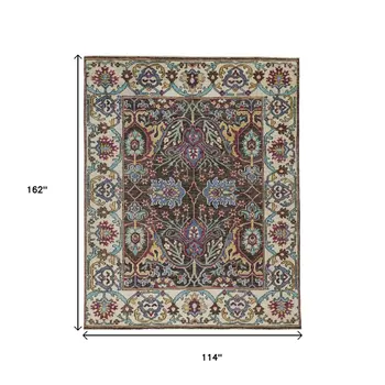 10' X 13' Ivory Brown And Blue Wool Floral Hand Knotted Distressed Stain Resistant Area Rug With Fringe