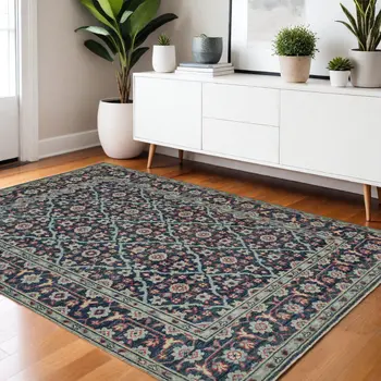 4' X 6' Blue and Green Wool Floral Hand Knotted Distressed Area Rug With Fringe