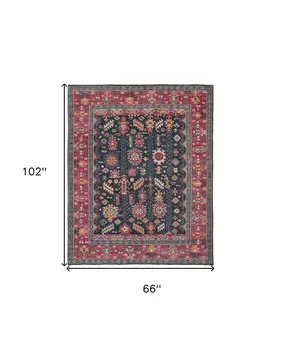 5' X 8' Pink Blue And Orange Wool Floral Hand Knotted Distressed Stain Resistant Area Rug With Fringe