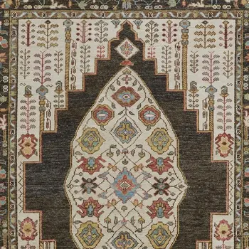 5' X 8' Brown Yellow And Green Wool Floral Hand Knotted Distressed Stain Resistant Area Rug With Fringe