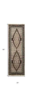 8' Green and Ivory Wool Floral Hand Knotted Distressed Runner Rug With Fringe