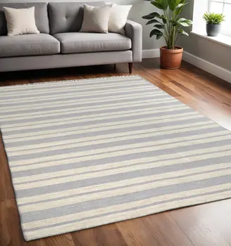 5' X 8' Blue Ivory And Tan Striped Dhurrie Hand Woven Stain Resistant Area Rug