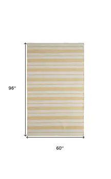 5' X 8' Yellow And Ivory Striped Dhurrie Hand Woven Stain Resistant Area Rug
