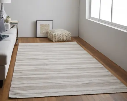 5' X 8' Ivory And Taupe Striped Dhurrie Hand Woven Stain Resistant Area Rug