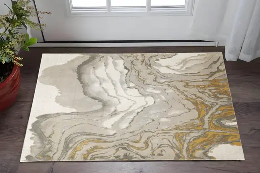 2' X 3' Gold Ivory And Gray Abstract Stain Resistant Area Rug